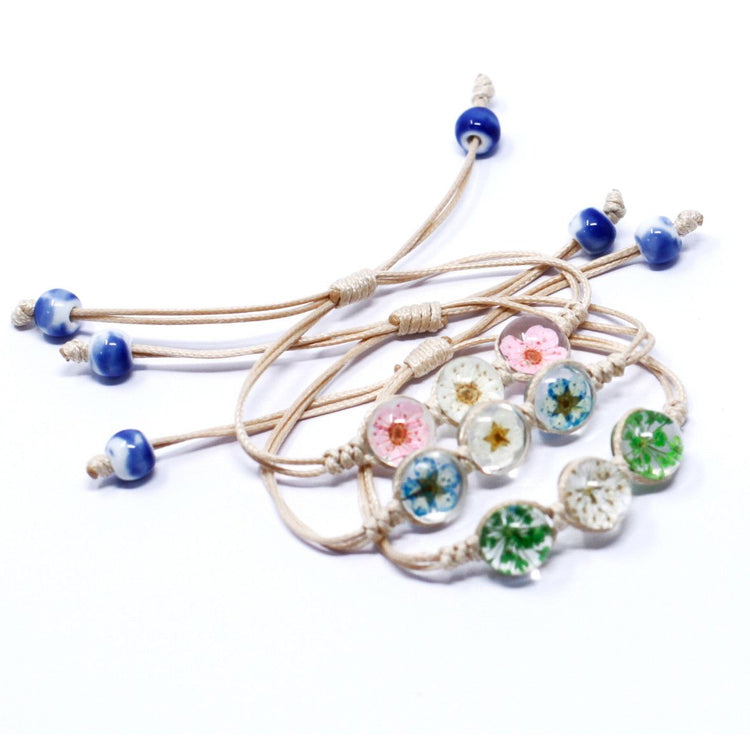 Pulsera de Piedras con Tres Flores