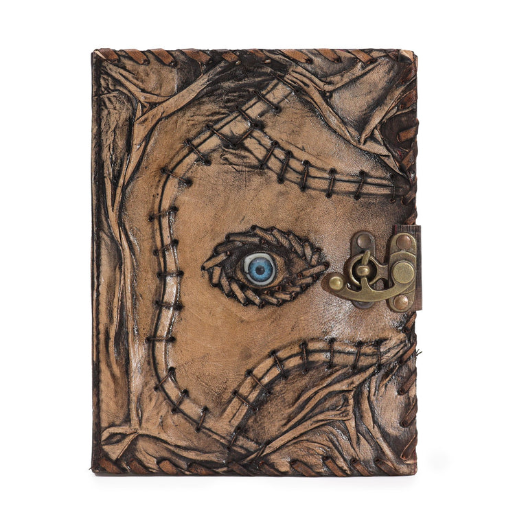 Cuaderno marrón de ojo malvado con bordes envejecidos